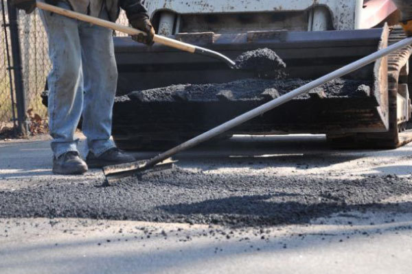 fresh asphalt for commercial property lot repair