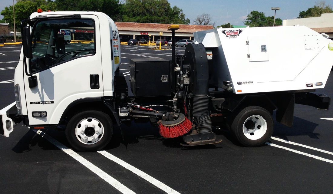 parking lot sweeper at work
